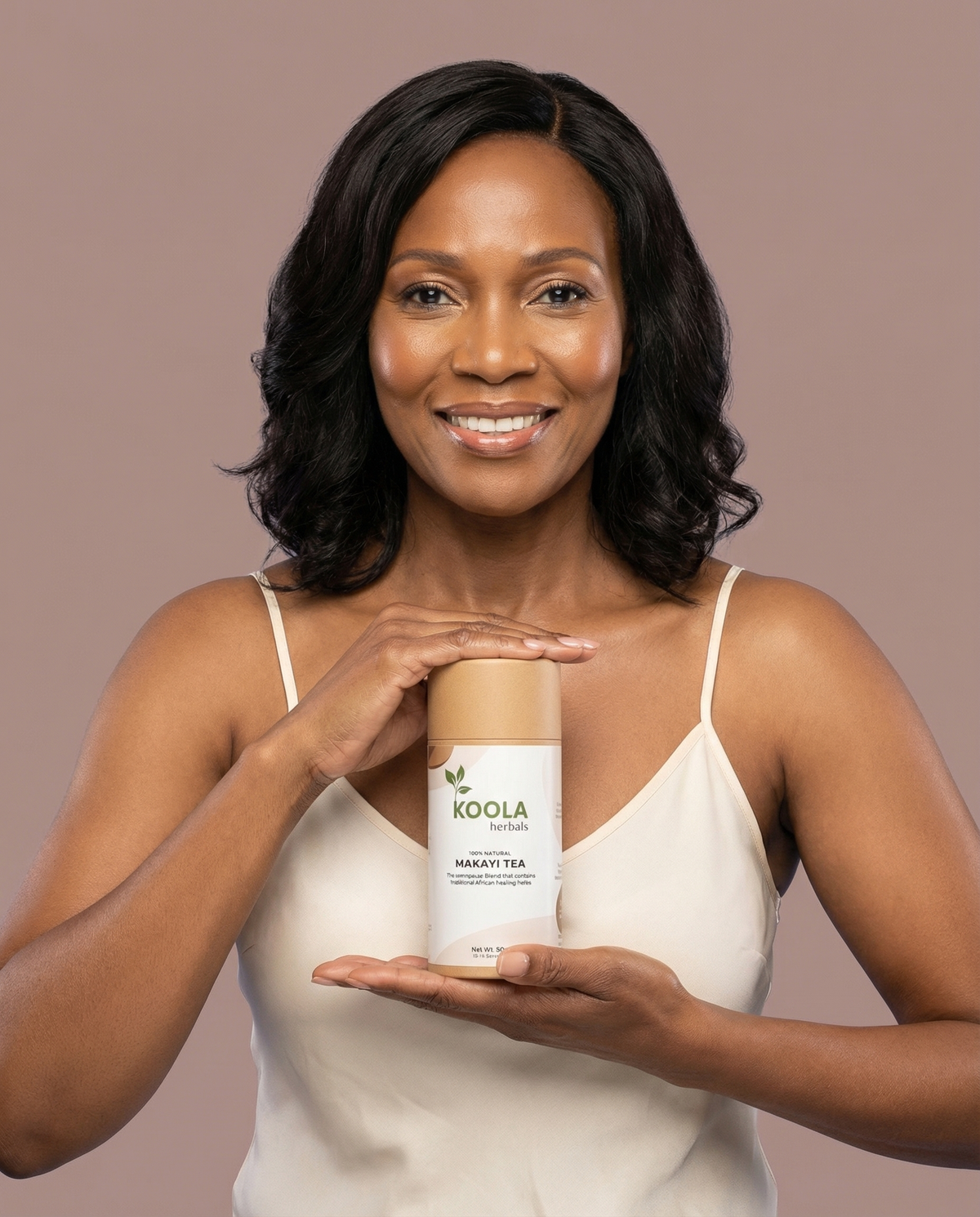 Woman holding a Koola product against a brown background