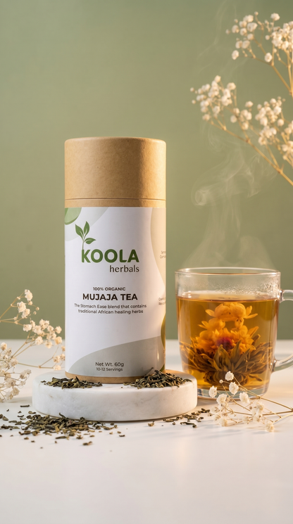 Koola Herball Mujjaja Tea packaging with a glass of tea and tea leaves on a light background